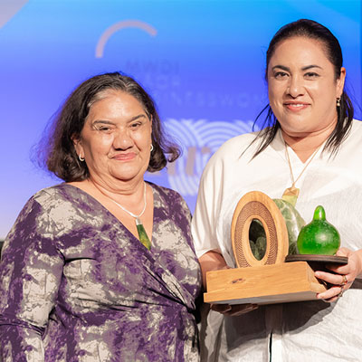 Ella Henry presents award to Trudy James